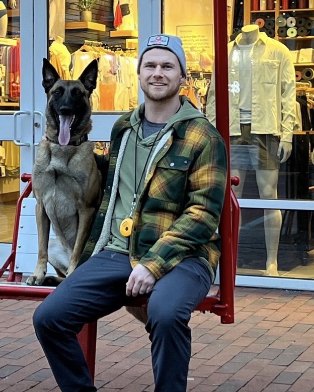 Jamie Wright with Jaxon, the three-legged Belgian Malinois behind Jaxon OS